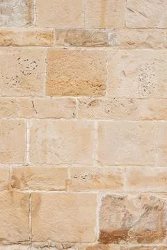 Gray and beige stone wall background Stock Photos