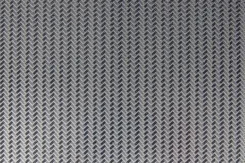 Gray and black chevron pattern creates a textured background Foto stock