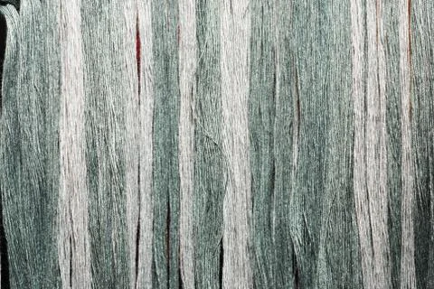 Gray and the green thread Stock Photos