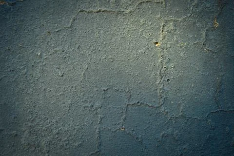 Gray and navy colored wall texture with rough cracks surface Stock Photos