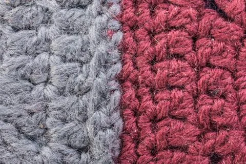 Gray and red knitted texture macro Stock Photos