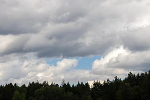 Gray and white clouds in blue sky Stock Photos
