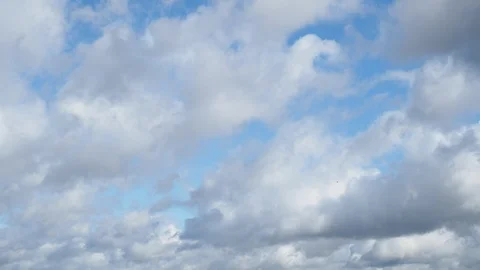 Gray and white clouds quickly run across blue autumn sky Stock Footage 95854550