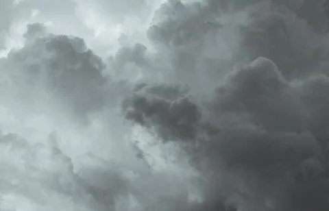 Gray and white fluffy clouds. Cloudy sky. White and gray texture background f 스톡 사진