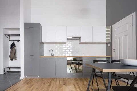 Gray and white open kitchen Stock Photos