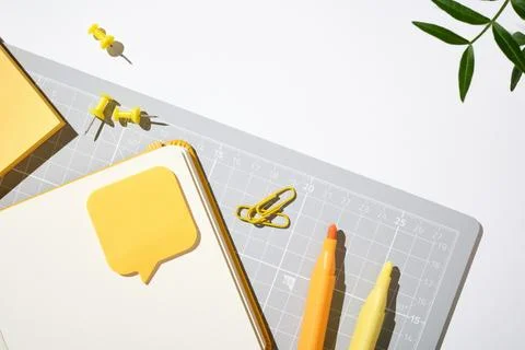 Gray and yellow workspace layout for planning and study on white background.. Stock Photos