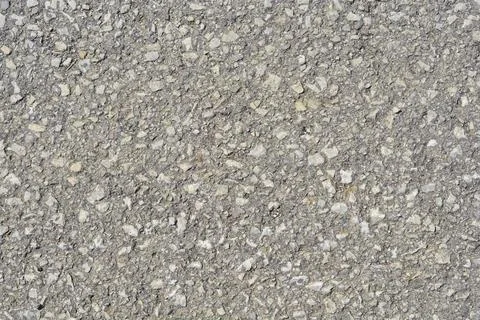 Gray asphalt texture background with small stones Stock Photos