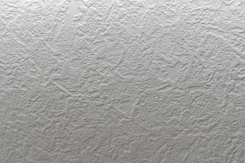 Gray background. Abstract texture of vinyl wallpaper on the wall. Foto stock