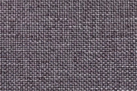 Gray background with braided checkered pattern. Texture of weaving fabric, ma Stock Photos