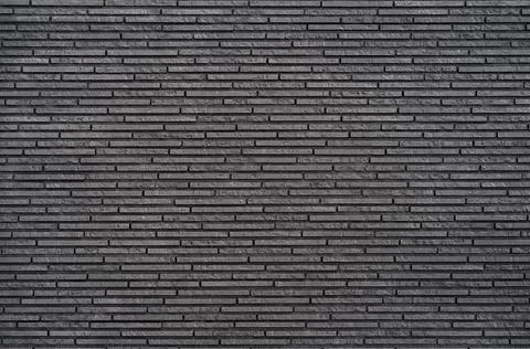 Gray background from decorative facing in the form of masonry 스톡 사진