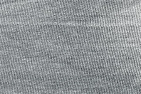 Gray background, denim jeans background. Jeans texture, fabric. Stock Photos
