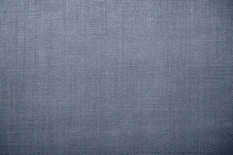 Gray background fabric texture. A piece of woolen cloth is neatly laid out on Stock Photos