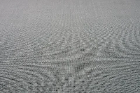 Gray background fabric texture. A piece of woolen cloth is neatly laid out on Stock Photos