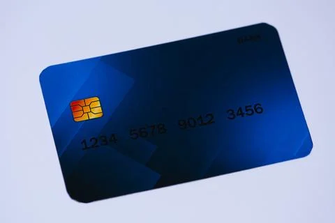 A gray background that has a dark blue card on it and a very nice color for a Stock Photos
