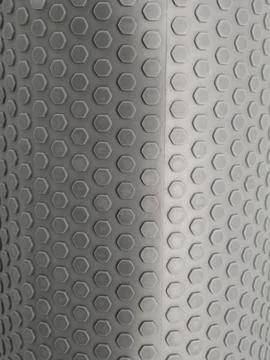 Gray background with hexagonal pattern on foam surface Stock Photos
