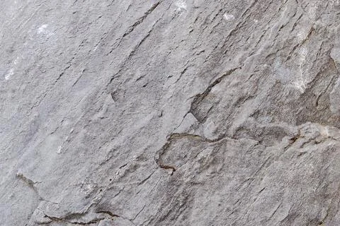 Gray background of old basalt stone, rocks Foto stock