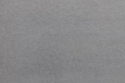 Gray background of smooth glossy paper close-up old for wallpaper Stock Photos