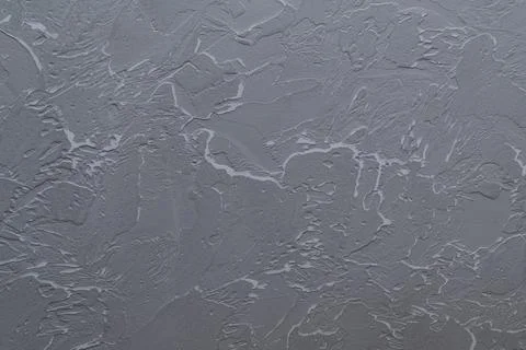 Gray background with textured paintable plaster. Decorative plastered venetia Foto stock