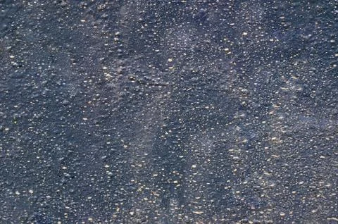 Gray background with white spray painted on a rough surface Stock Photos