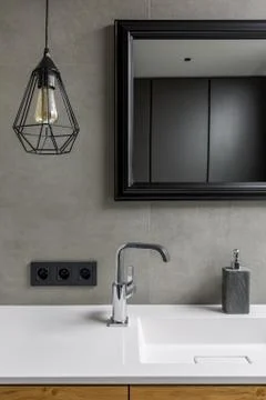 Gray bathroom with mirror Foto stock