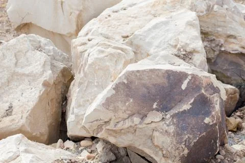 Gray-beige stone texture. Rock. Stone background. Relief surface. Beautiful n Stock Photos