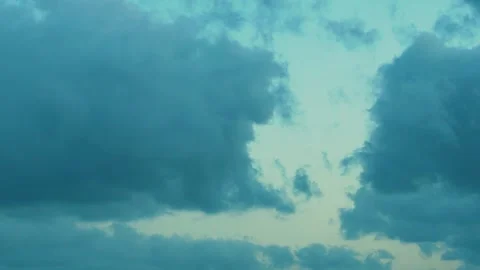 Gray Black Storm Cumulus Clouds and Dramatic Atmosphere Blue Yellow Sunrise Sky  Stock-Footage 299232921