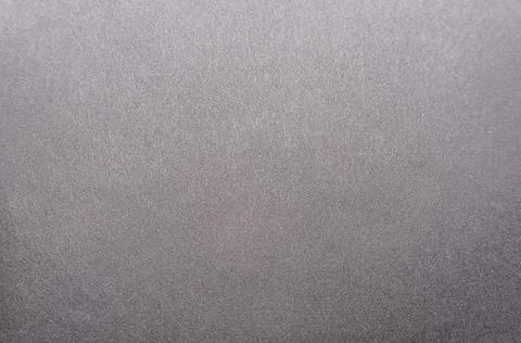 A gray black wall for inscriptions. Graphite wall. Wall for ads. Blackboard. Stock Photos