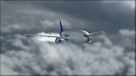 A gray-blue jetliner flying above the clouds. Blurred background. Airplane Stock Footage 146611548