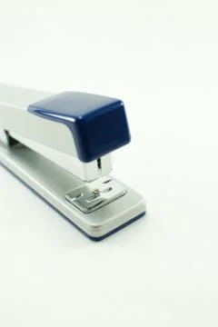 Gray-blue stapler on a white background; isolated  Foto stock