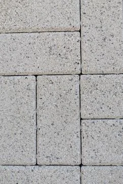 Gray brick stone wall close up Stock Photos