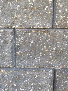 Gray brick stone wall close up Stock Photos