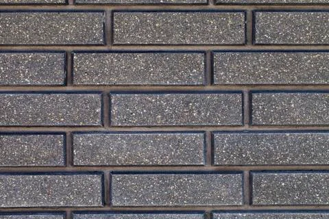 Gray brick wall background Stock Photos