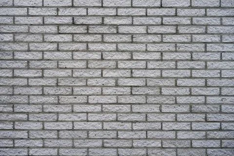 Gray brick wall background Stock Photos
