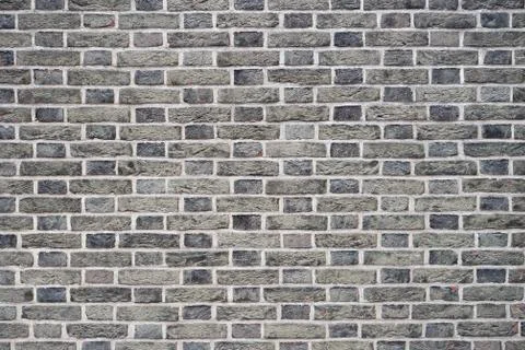 Gray brick wall background Stock Photos