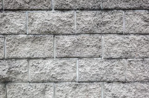 Gray brick wall background Stock Photos