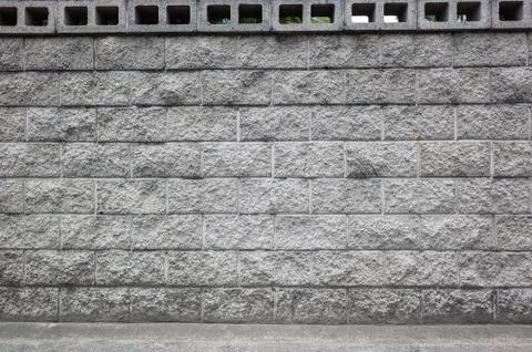 Gray brick wall background Stock Photos