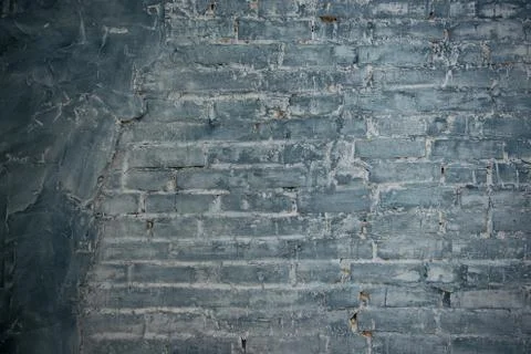 Gray brick wall background. Texture of painted brick. Stock Photos