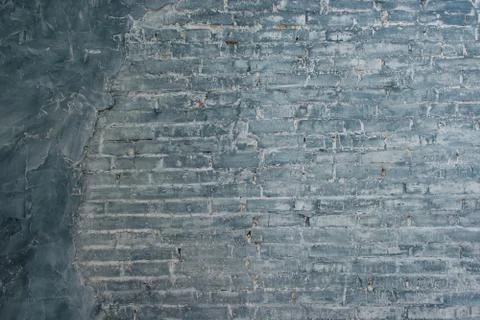 Gray brick wall background. Texture of painted brick. Stock Photos