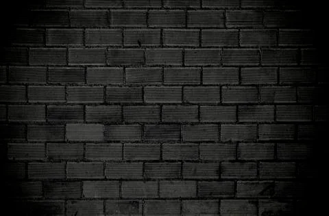 Gray brick wall with dark vignette borders Stock Photos
