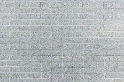 Gray brick wall, grunge background. Copy space Stock-Fotos
