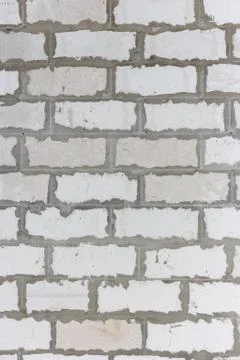 Gray brick wall with mortar joints Stock Photos