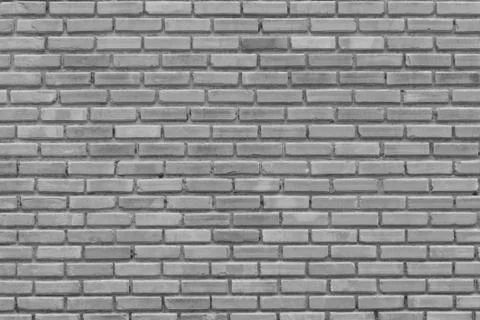 Gray brick wall for pattern,background and design Stock Photos