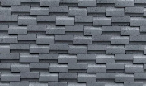 Gray brick wall with simple pattern. Gray wall texture abstract background. M Stock Photos
