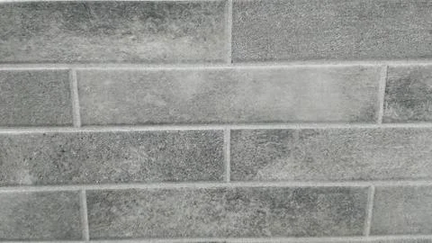 The gray brick wall texture background Stock Photos