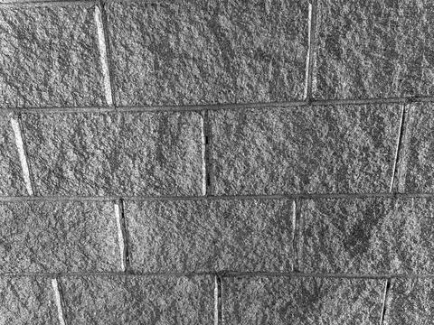Gray brick wall texture with mortar lines background Stock Photos