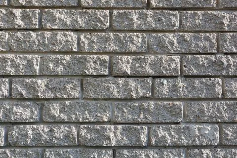 Gray brickwork used in the construction of a stone house. T Stock Photos