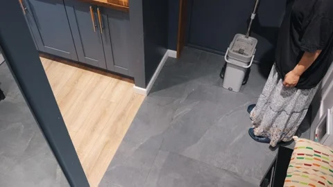 Gray Bucket During Indoor Floor Cleaning Stock-Footage 335590451