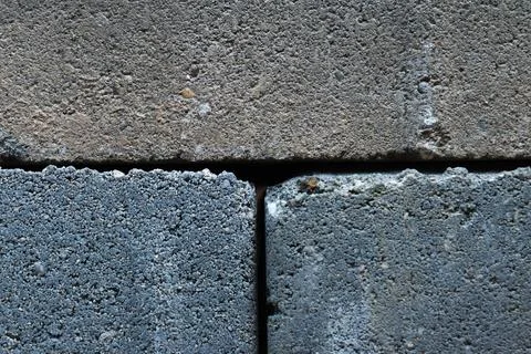 Gray building cinder blocks made of cement stacked close-up background. Lot o Stock Photos