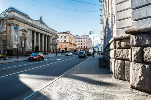Gray building with columns and statues Stock Photos