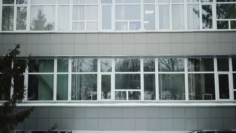Gray building with large glass windows Stock-Footage 111243140